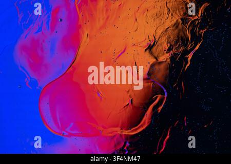 Fluid texture creating dynamic motion and contrasting colors in a macro composition Stock Photo