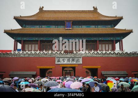 Beijing, People's Republic of China - August 27, 2017: The Wumen Gate, also known as Meridian Gate, features a dark red wall at its base with a centra Stock Photo