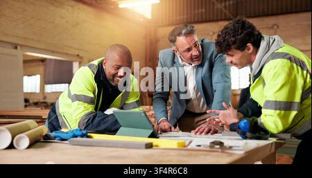 Carpentry, team and tablet in workshop for planning, apprentice insight and mentorship with timber. People, supervisor and trainee with tech for Stock Photo
