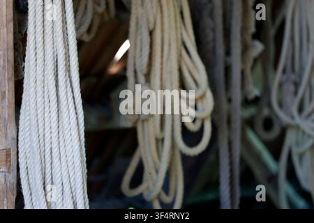 Various ropes made of natural materials, used in the historical reconstruction of the Château de Guédelon. Treigny, France. Stock Photo