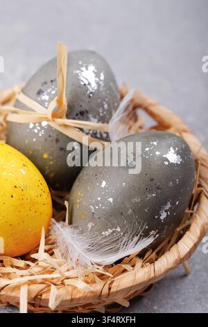 Easter greeting card eggs in nest close up Stock Photo