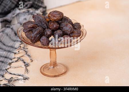 Dried dates. Sweet fruit food on plate Stock Photo