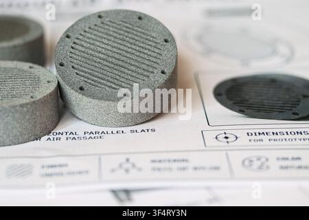 MJF 3D printed parts with ridged pattern on technical blueprint background Stock Photo