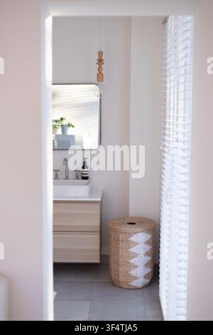 Minimal Scandinavian Bathroom Interior with Oak Vanity and Natural Decor Stock Photo