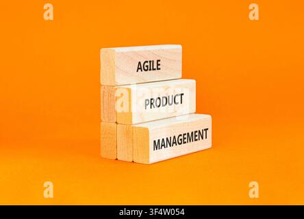 Agile product management words symbol. Concept words Agile product management on beautiful wooden blocks. Beautiful orange background. Business agile Stock Photo