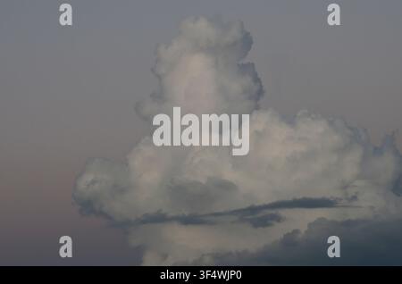Cumulus Clouds just after sunset Stock Photo