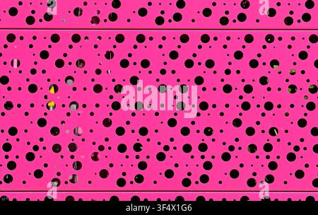 Perforated metal sheet painted pink in Tijuca neighborhood, Rio de Janeiro, Brazil Stock Photo
