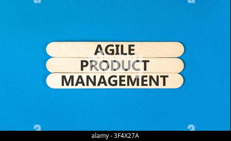 Agile product management words symbol. Concept words Agile product management on beautiful wooden sticks. Beautiful blue background. Business agile pr Stock Photo