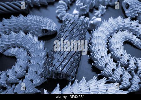 Art models printed on 3D printer. Different objects created on 3D printer from molten plastic. 3D printed different objects. Modern new modern additive progressive technologies. 3D printing technology Stock Photo