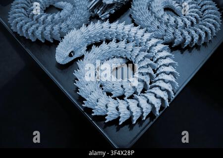 Art models printed on 3D printer. Different objects created on 3D printer from molten plastic. 3D printed different objects. Modern new modern additive progressive technologies. 3D printing technology Stock Photo