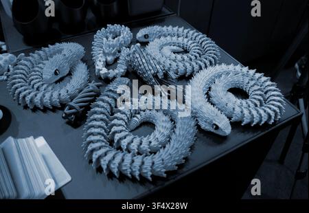 Art models printed on 3D printer. Different objects created on 3D printer from molten plastic. 3D printed different objects. Modern new modern additive progressive technologies. 3D printing technology Stock Photo