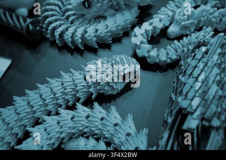 Art models printed on 3D printer. Different objects created on 3D printer from molten plastic. 3D printed different objects. Modern new modern additive progressive technologies. 3D printing technology Stock Photo