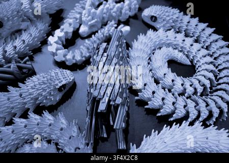 Art models printed on 3D printer. Different objects created on 3D printer from molten plastic. 3D printed different objects. Modern new modern additive progressive technologies. 3D printing technology Stock Photo