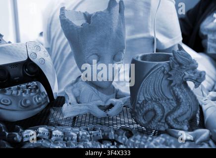 Art models printed on 3D printer. Different objects created on 3D printer from molten plastic. 3D printed different objects. Modern new modern additive progressive technologies. 3D printing technology Stock Photo