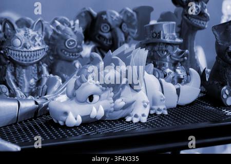 Art models printed on 3D printer. Different objects created on 3D printer from molten plastic. 3D printed different objects. Modern new modern additive progressive technologies. 3D printing technology Stock Photo