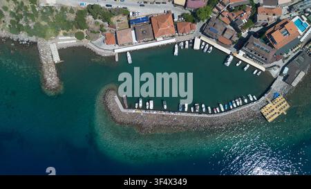 Top Down Aerial View of Historic Assos Old Harbor in Canakkale Turkey Stock Photo