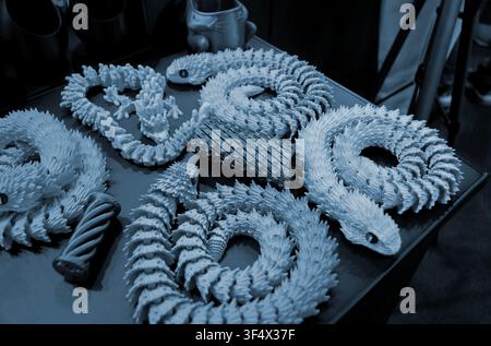 Art models printed on 3D printer. Different objects created on 3D printer from molten plastic. 3D printed different objects. Modern new modern additive progressive technologies. 3D printing technology Stock Photo