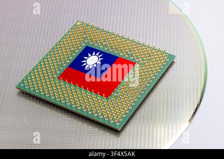 Taiwan flag on Computer Chip for Chip War Concept. Global chipmakers CPU Central processing Unit Microchip on Motherboard Taiwan world largest chip ma Stock Photo