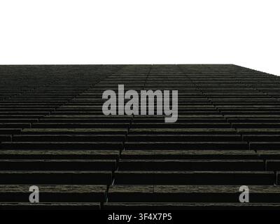 Dark stone facade with stacked horizontal slabs viewed from below near the Imperial Palace, Tokyo, Japan Stock Photo