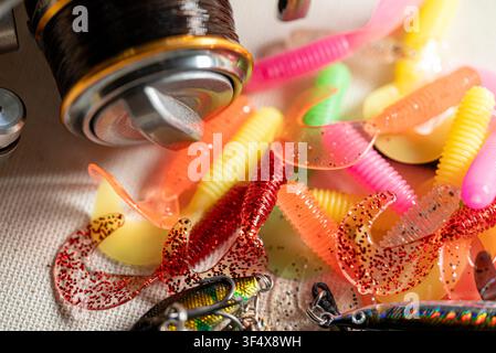 Professional angling equipment with braided line and sparkly grub lures Stock Photo