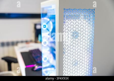 Modern computer case with RGB fans providing a powerful gaming experience Stock Photo