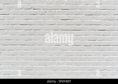 white painted brick wall for background use Stock Photo