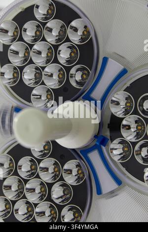 An overhead surgical light is photographed inside a medical clinic in London, England, on 27 April 2021. Stock Photo