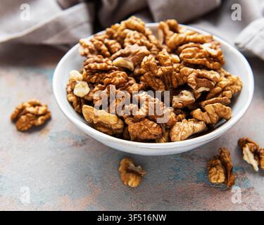 Walnuts without shell on a concrete background Stock Photo