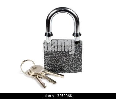 Padlock with keys isolated on white background. New padlock close-up. Stock Photo