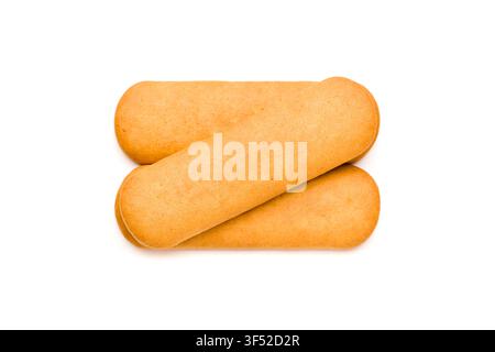 Three overlapping golden rectangular crackers isolated on clean white background Stock Photo