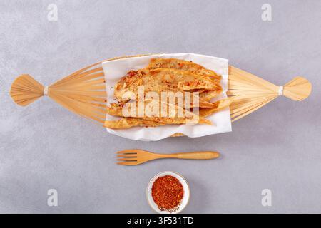 Pan Fried Tongue Sole Fish Fillets Served with Lemon Slices Stock Photo