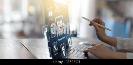 LLM large language model platform for AI text generation and natural language processing with hand interaction on laptop Stock Photo