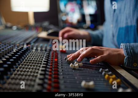Ensuring precise level harmony and teamwork in highquality professional music studio Stock Photo