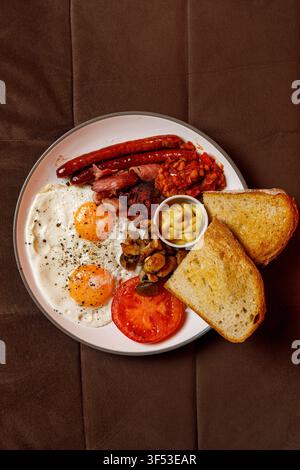 Classic English breakfast on a plate, isolated. Stock Photo