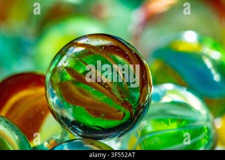 Swirling colors and reflective surfaces creating an abstract macro background Stock Photo