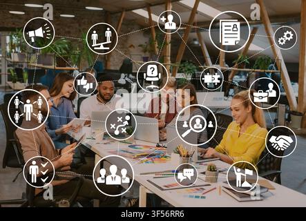 Team of designers working on project sitting in office, collage Stock Photo