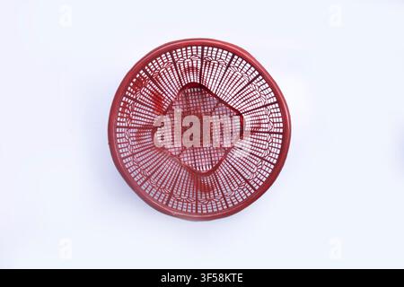 Empty Red Plastic Basket on White Background Stock Photo