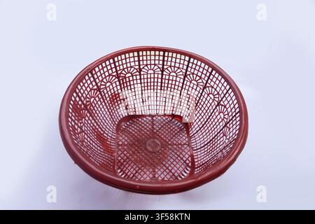 Empty Red Plastic Basket on White Background Stock Photo