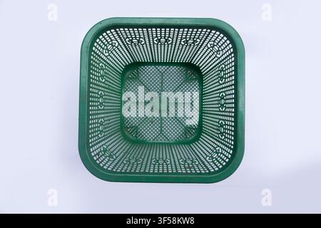 Green Plastic Basket Isolated on White Background Stock Photo