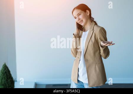 Young woman having professional phone call conversation Stock Photo
