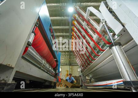 Luanan, China - July 30, 2026: Carton Printing Production Line and Workshop Operators Stock Photo