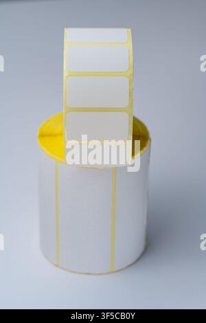 Rolls of white labels isolated. Labels for direct thermal or thermal transfer printing. Blank sticky label roll for thermal transfer printing pirce cr Stock Photo