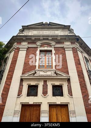 Historic Red Brick Corner Building with White Accents (Mexico City, Mexico) Stock Photo