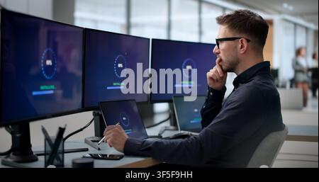 Man Installing New Software Update On Laptop To Fix Slow Loading. Stock Photo