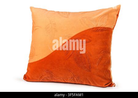 Velvet pillow with a pattern on a white background. Two-tone velvet pillow close-up. Stock Photo
