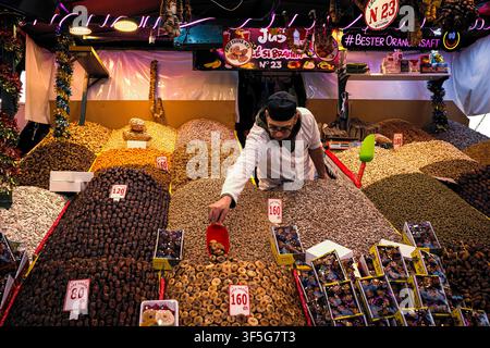 Beautiful view of an assortment of exotic nuts, dates and figs on the shelves of a market stand in the Jemaa el-Fnaa square in Marrakech, Morocco Stock Photo