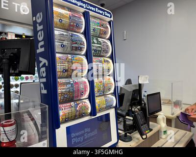 National Lottery scratchcards displayed at a supermarket checkout counter in the United Kingdom. Stock Photo