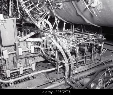 The TF-30 A B engine and control room, a component of a U.S. aerospace facility, in a mid-20th century. Stock Photo