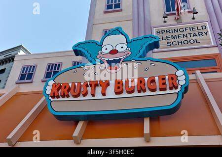 Krusty Burger sign in front of Springfield Elementary School facade, Universal Studios Hollywood Stock Photo
