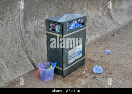 A full bin on the promenade at Hunstanton, Norfolk, UK Stock Photo